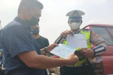 Tilang Uji Emisi di...