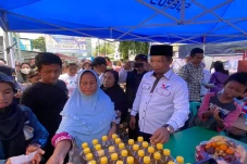 Caleg Dina Masyusin...