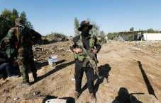 6 Fakta Kataib Hizbullah,...