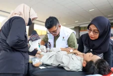 Baznas bersama WOM Finance...