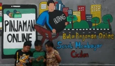 OJK Blokir 2.422 Nomor...