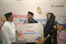 AXA Mandiri Berbagi...