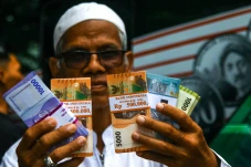 Potret Penukaran Uang...