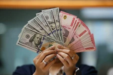 Rupiah Ditutup Melemah...