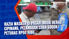 Razia Masker di Pasar...