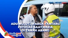 Adu Mulut, Warga Tantang...
