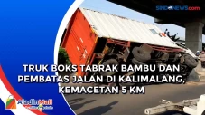Truk Boks Tabrak Bambu...
