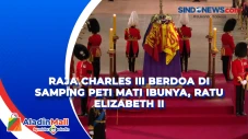Raja Charles III Berdoa...