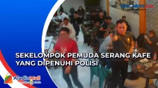 Kafe Diserang Sekelompok...