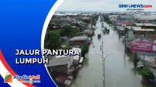 Banjir Lumpuhkan Jalur...