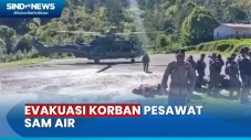 Evakuasi Korban Pesawat...