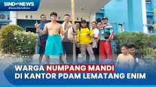 Warga Numpang Mandi...