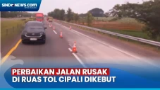 Perbaikan Jalan Rusak...