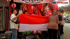 Pedagang Bendera Berlomba...