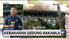 Polisi Olah TKP Gedung...