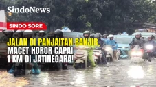 Jalan DI Panjaitan Banjir,...
