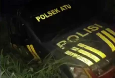 Mobil Polisi Pengangkut...