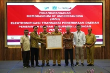 Bank Jatim dan Pemkab...