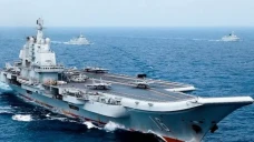 Militer China Kepung...