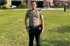 Polisi Bunuh Bayi di...