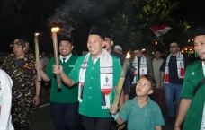 Gelar Pawai Obor Kemanusiaan,...