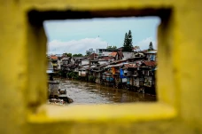 Normalisasi Kali Ciliwung,...