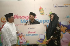 AXA Mandiri Berbagi...