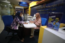Penerimaan Pajak Bulan...