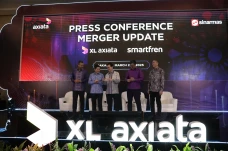 Pemegang Saham XL Axiata...