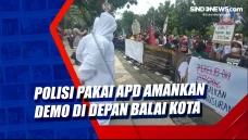 Polisi Pakai APD Amankan...