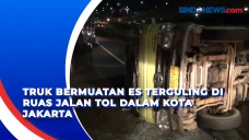 Truk Bermuatan Es Terguling...