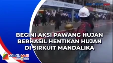 Begini Aksi Pawang Hujan...