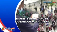 Tradisi Sebar Uang di...