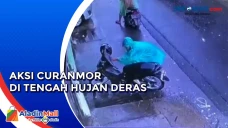 Di Tengah Hujan Deras...