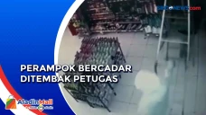 Beraksi Gunakan Kerudung...