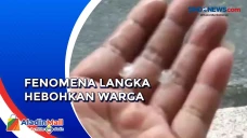 Hujan Es Turun di Kota...