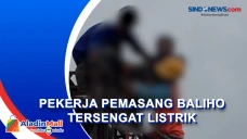 Pekerja Pemasang Baliho...
