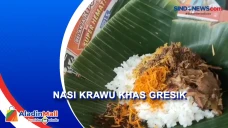 Menyantap Nasi Krawu...