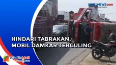 Mobil Damkar Terguling...
