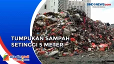 Gunungan Sampah Setinggi...
