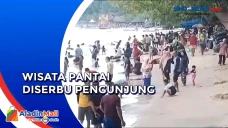 Wisata Pantai Diserbu...
