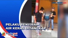 Pelaku Penyiraman Air...