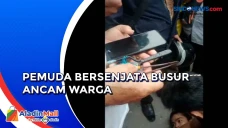 Pemuda Bersenjata Busur...