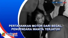 Pengendara Motor Wanita...