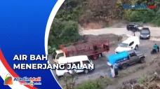 Air Bah Menerjang Ruas...