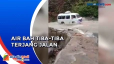 Air Bah Terjang Jalan...