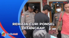Beraksi Curi Ponsel...