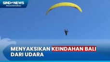 Berwisata dengan Paramotor,...