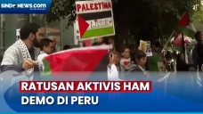 Ratusan Demonstran Kecam...