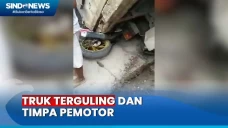 Truk Terguling dan Timpa...